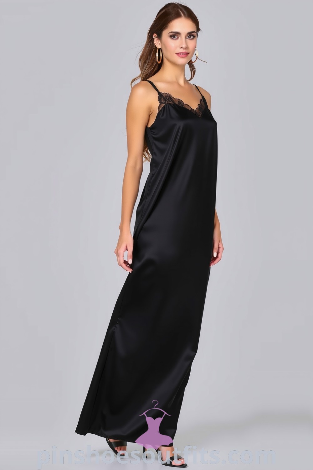 Elegant black satin slip dress with lace trim, strappy heels, and gold hoop earrings, perfect for a romantic night out. Discover stylish outfit ideas to look classy and elegant at pinshoesoutfits.com.