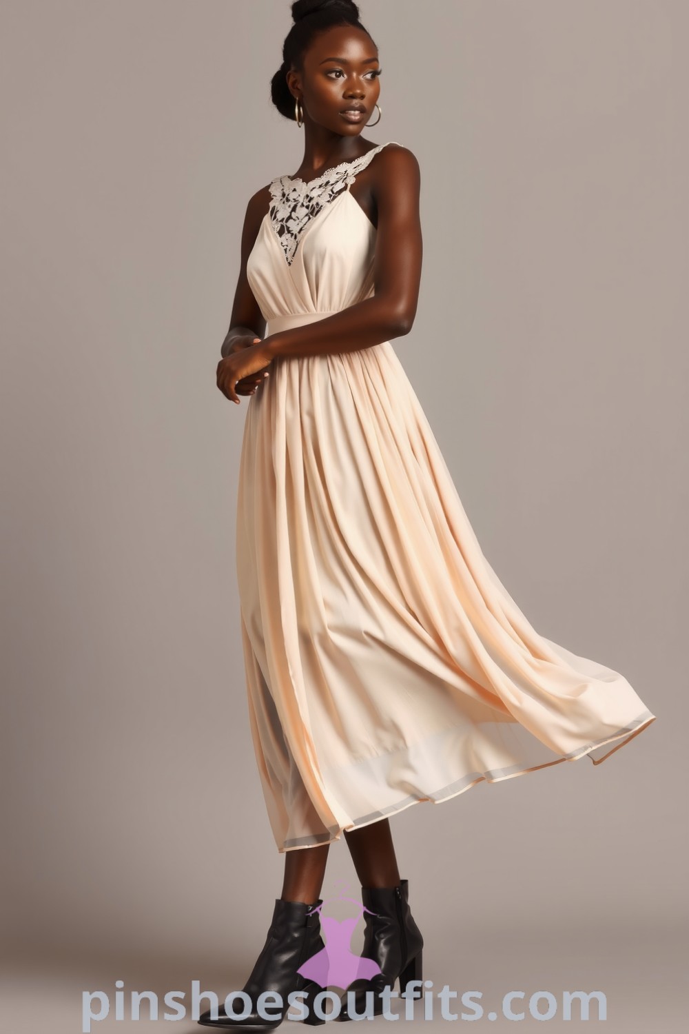 A Black woman models a flowing midi dress made from soft chiffon with lace details, complemented by sleek ankle boots. A stylish outfit idea for weddings and soirées, embodying elegance and grace. pinshoesoutfits.com
