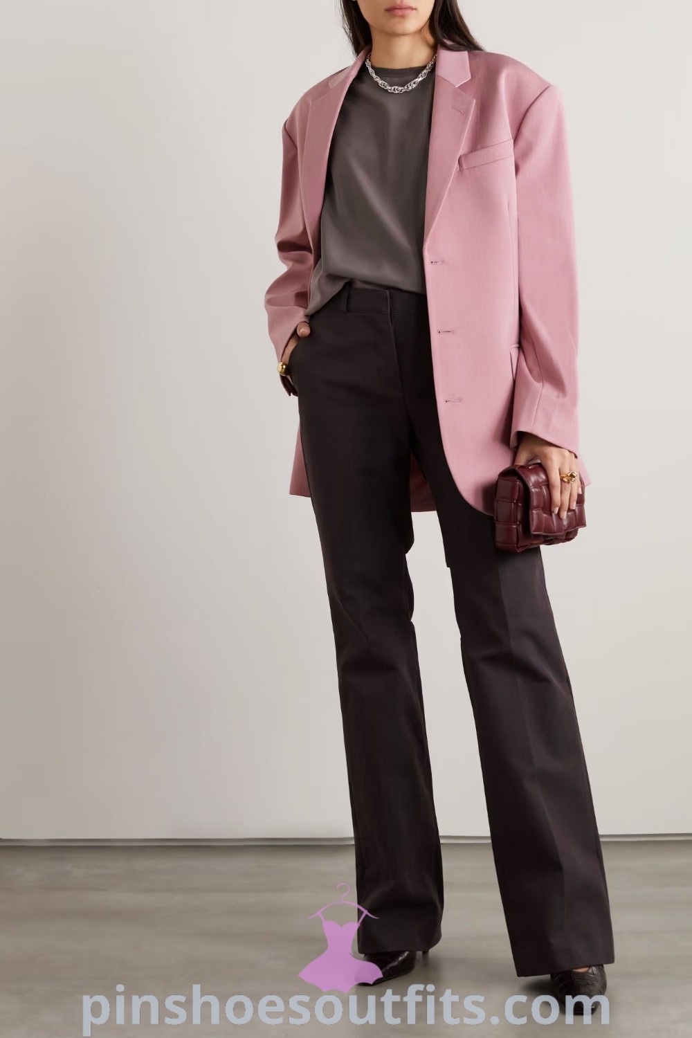 Stylish pink blazer and cute jeans create chic winter work attire perfect for the office. This classy outfit is ideal for showcasing your fashion sense while maintaining professionalism. Discover more outfit ideas to inspire your look this season at pinshoesoutfits.com.