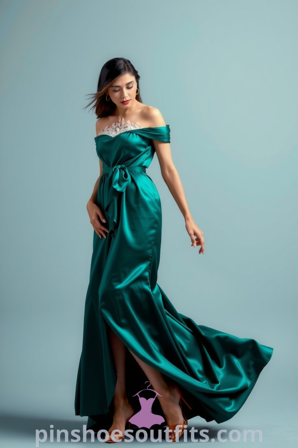 Elegant off-the-shoulder satin dress in rich emerald color with lace detailing and a cinched waist, paired with strappy heels and understated jewelry. An inspiring outfit idea to look chic and elegant. pinshoesoutfits.com