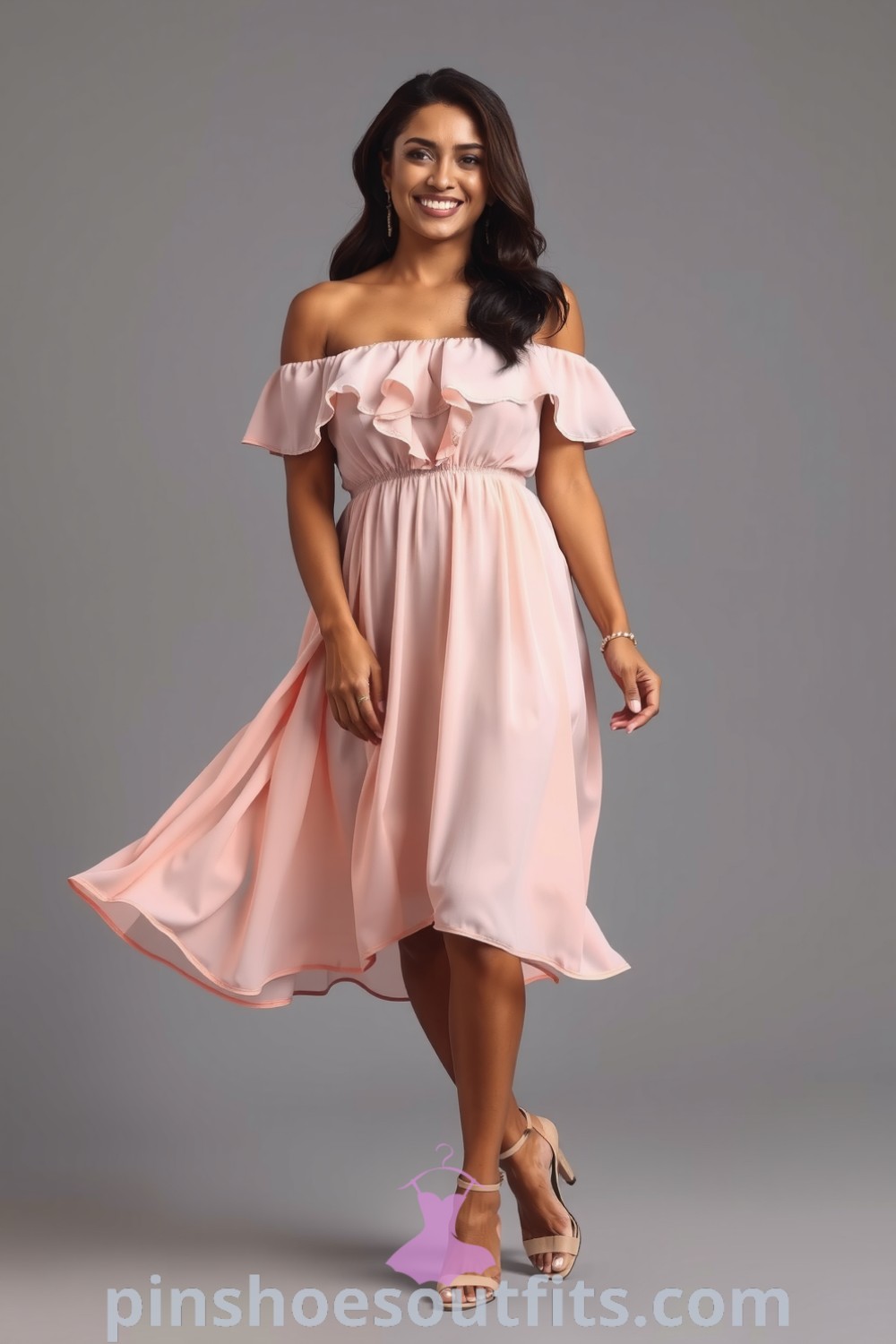 Beautiful Latina woman in an off-the-shoulder blush chiffon dress with ruffle details, complemented by strappy nude heels and gold accessories, showcasing elegant outfit ideas to inspire your look this season. pinshoesoutfits.com