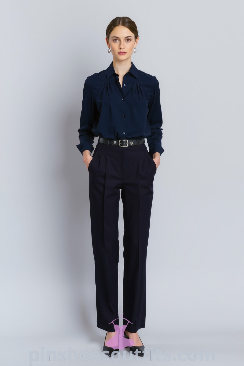 Sophisticated office outfit featuring a tailored blouse, high-waisted wide-leg trousers, and minimalist heeled mules, balancing professionalism with contemporary style. pinshoesoutfits.com