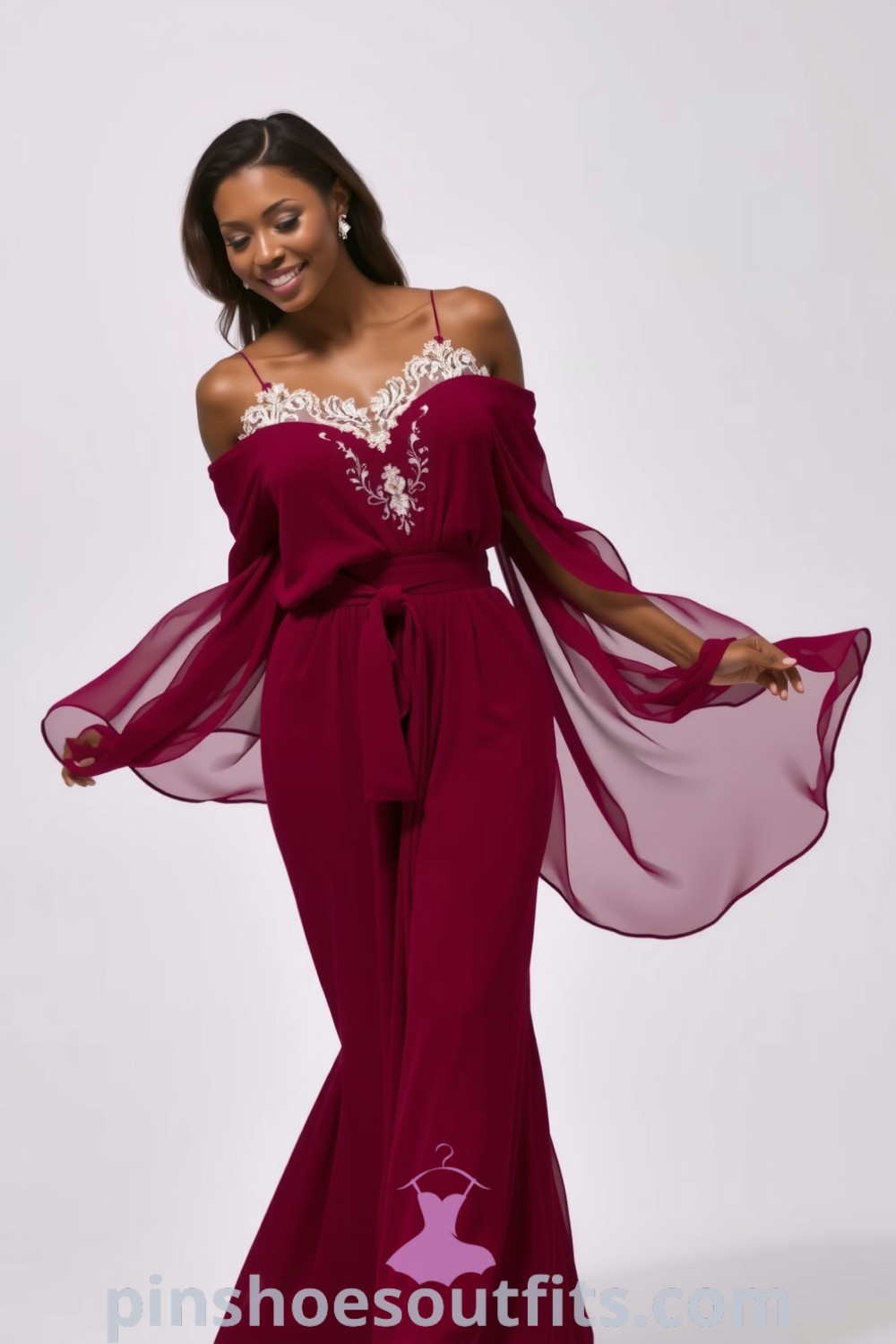 Stunning black woman in an off-the-shoulder burgundy chiffon gown with lace detailing, ideal for romantic dinners. Elegant and stylish, this outfit inspires chic and classy looks. pinshoesoutfits.com