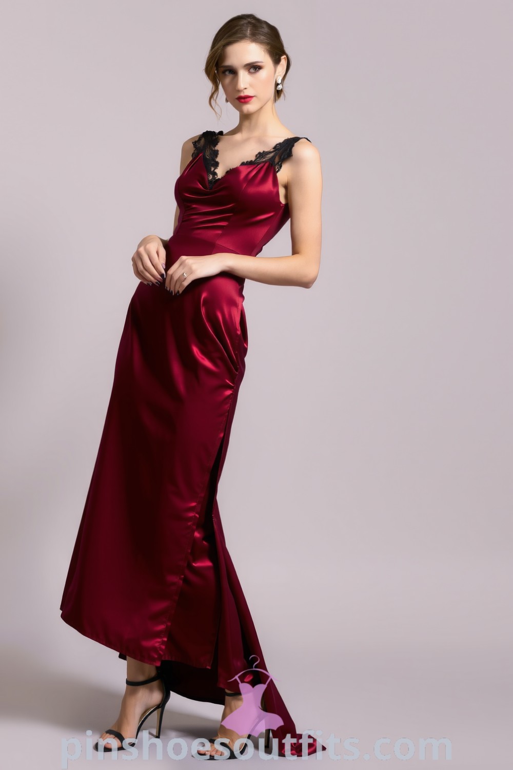 Elegant deep red satin dress with lace detailing and a side slit, paired with strappy black heels. A stylish outfit idea to inspire your look this season. pinshoesoutfits.com