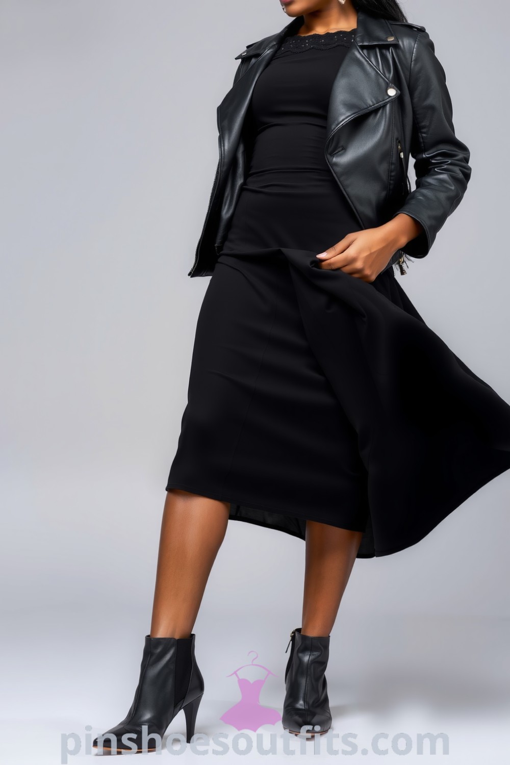 Chic black midi dress with lace trim, flowing skirt, almond-toed ankle boots, and a leather jacket. A stylish outfit inspiring elegance and sophistication. pinshoesoutfits.com